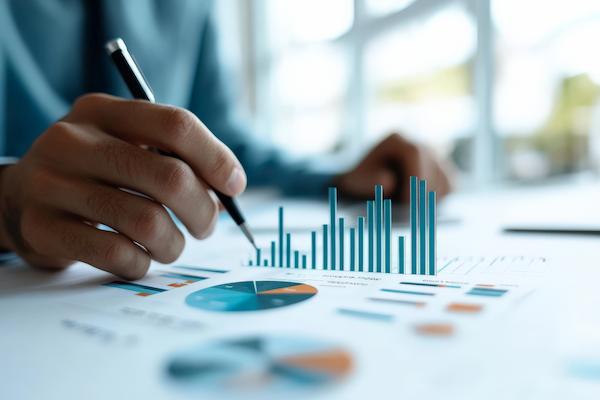 Team reviewing Medicare and Medicaid cost reports in a professional healthcare finance setting