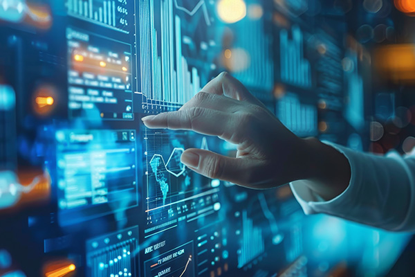 Person analyzing financial data on touchscreen for risk management consulting purposes